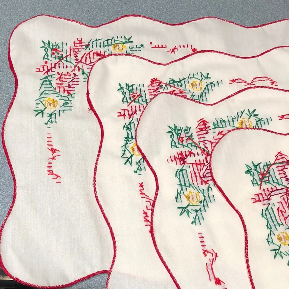 Embroidered Table Linens with Red Trim